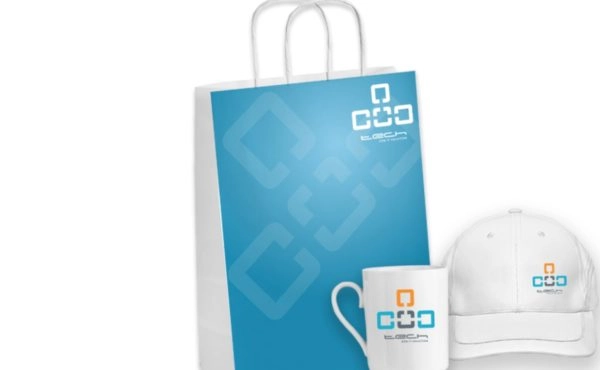 promotional products: blue paper bag, white baseball hat and white coffee mug