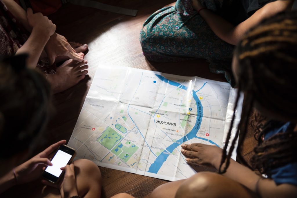 people looking at a map