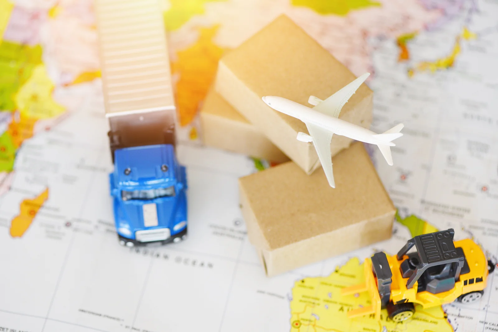 Toy Truck, Airplane and Forklift on a Map