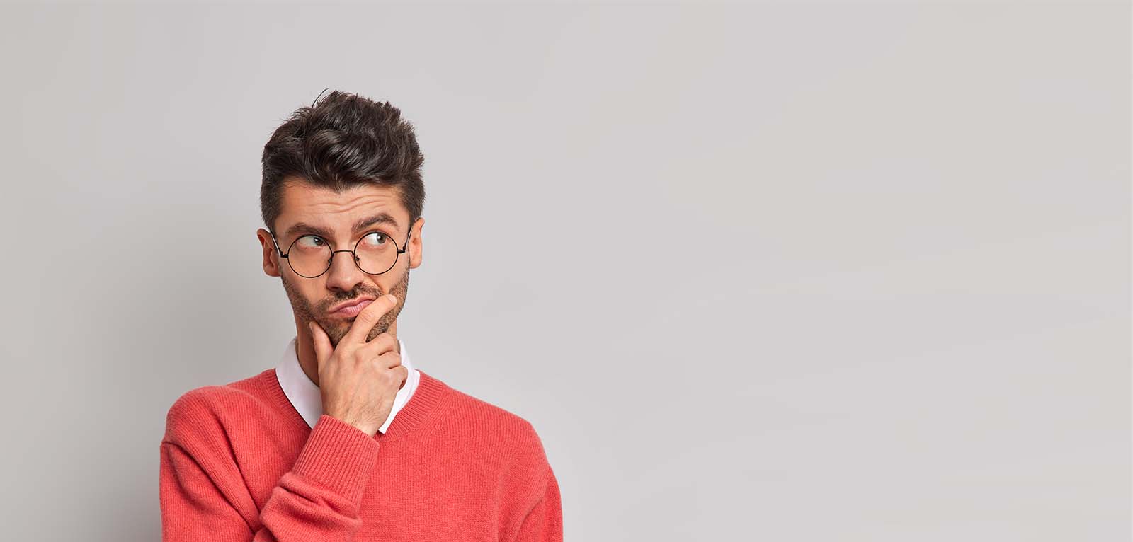 Man with confused look on his face.